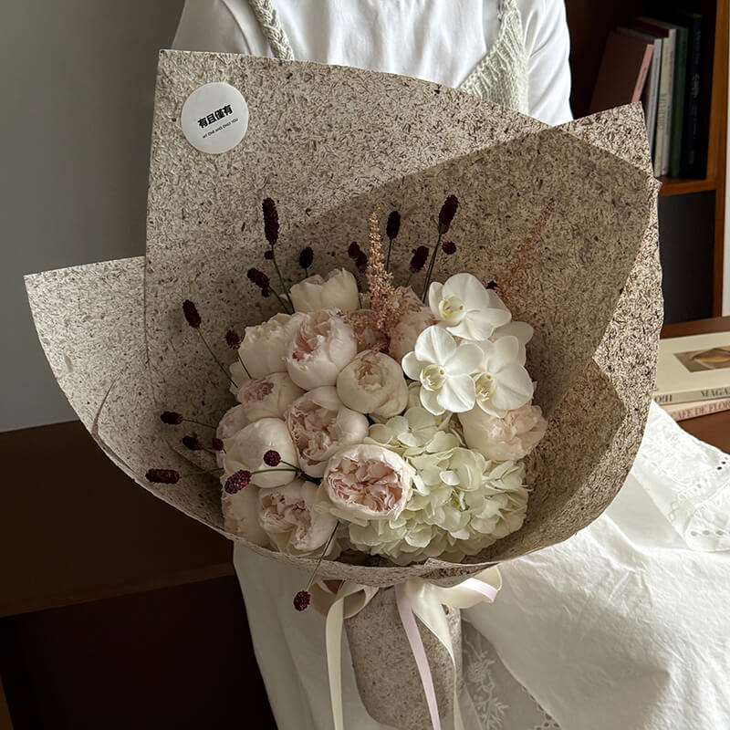 Boîte à fleurs ronde en velours 