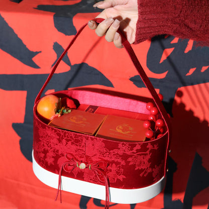 Chinese Leather and Brocade Oval Gift Box