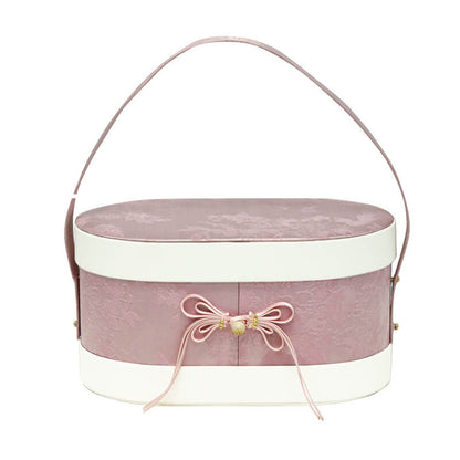 Chinese Leather and Brocade Oval Gift Box