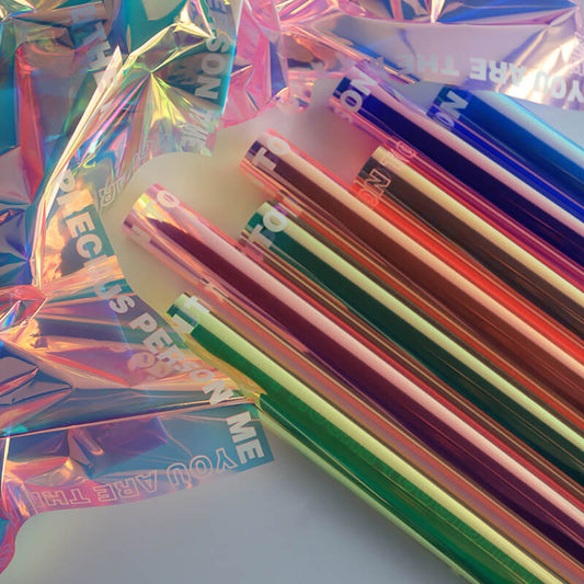 Papel de regalo fluorescente para caramelos de colores 