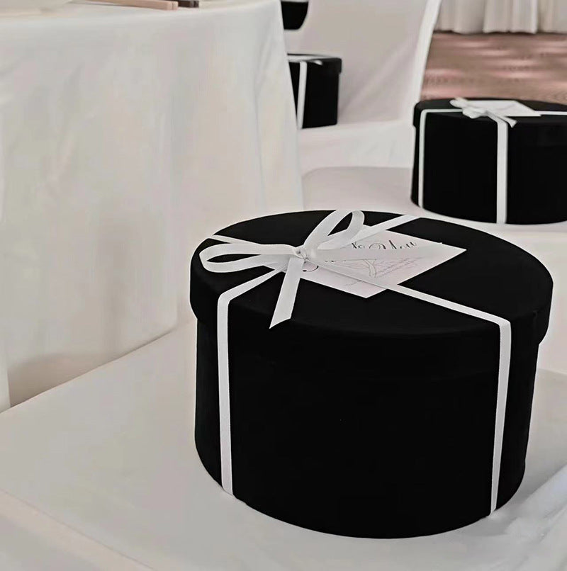 Boîte à fleurs ronde en velours 