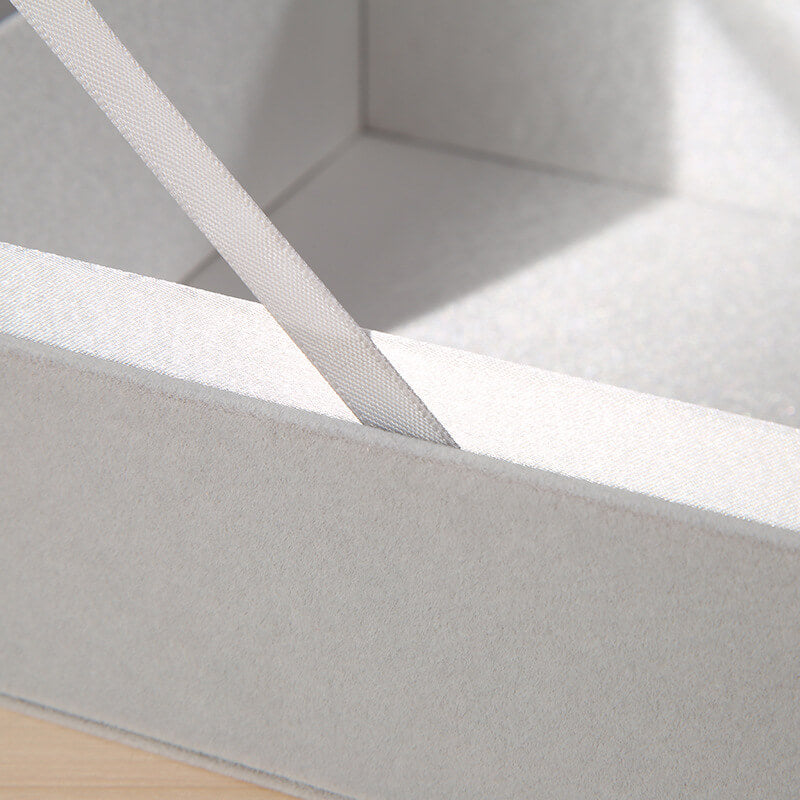 Boîte à fleurs ronde en velours 