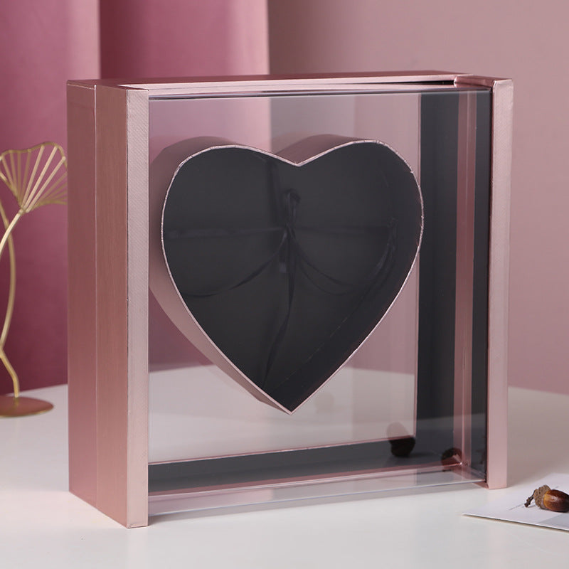 Cajas de flores con forma de corazón de acrílico y rosas en forma de ventana