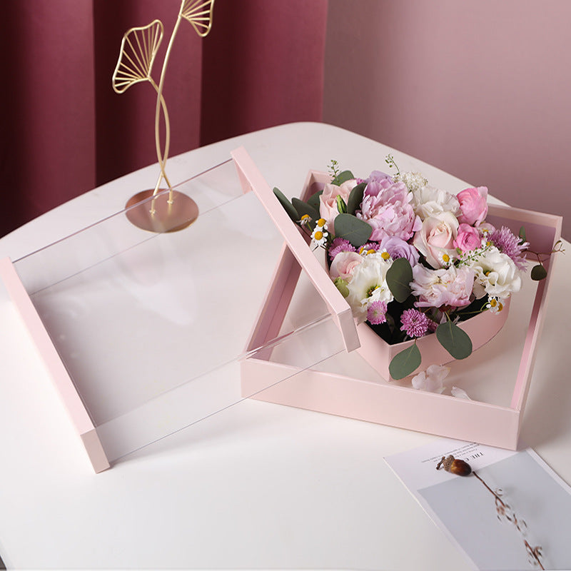 Cajas de flores con forma de corazón de acrílico y rosas en forma de ventana