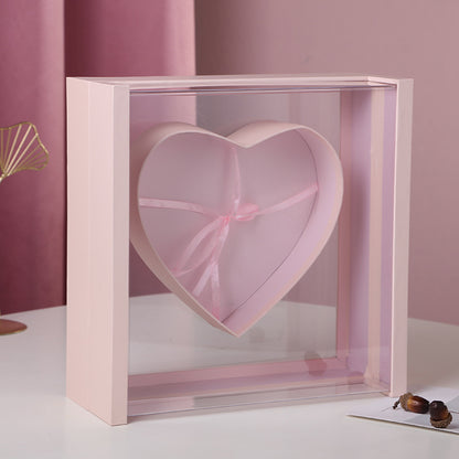 Cajas de flores con forma de corazón de acrílico y rosas en forma de ventana