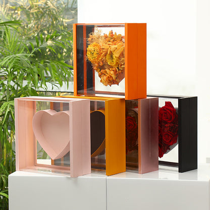 Cajas de flores con forma de corazón de acrílico y rosas en forma de ventana