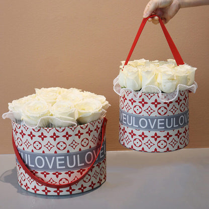 Caja de regalo redonda con forma de flor, asa de piel sintética y satén, juego de 2 unidades