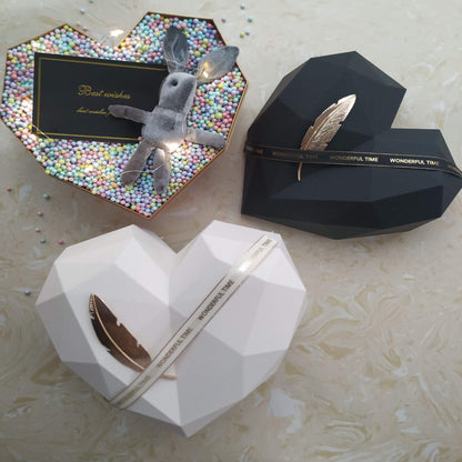 Cajas de regalo con ramos en forma de corazón